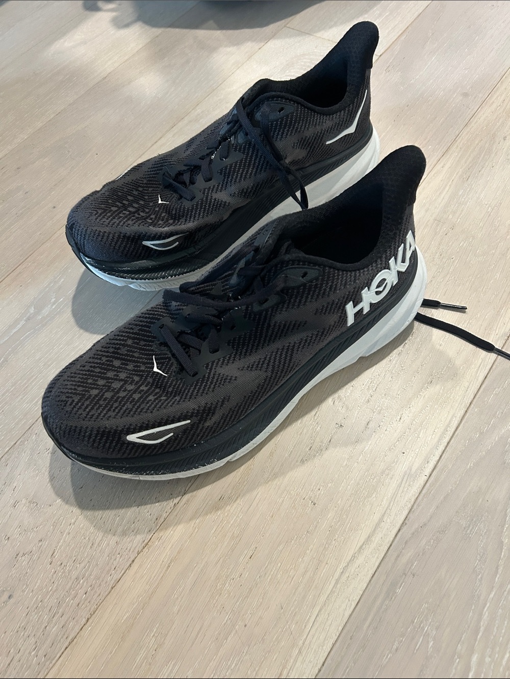Hoka Black and White Road Running Shoes